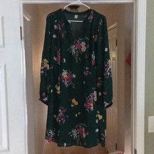 Long sleeved multi flowered dark green dress